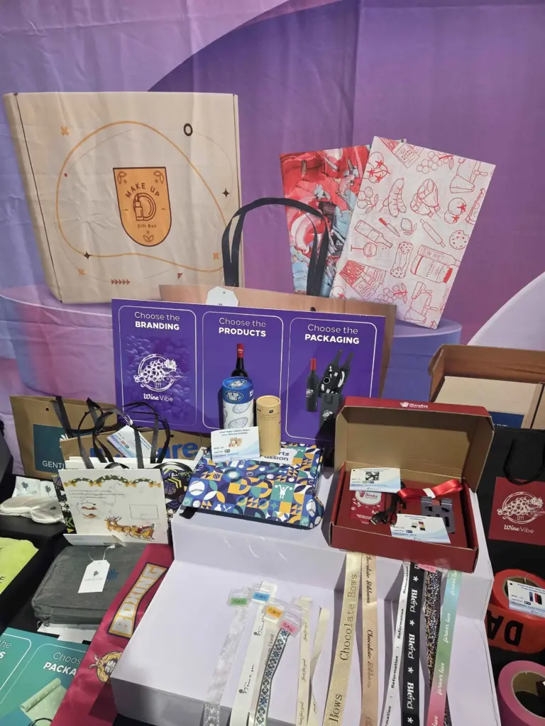 table with different promotional items in a trade show